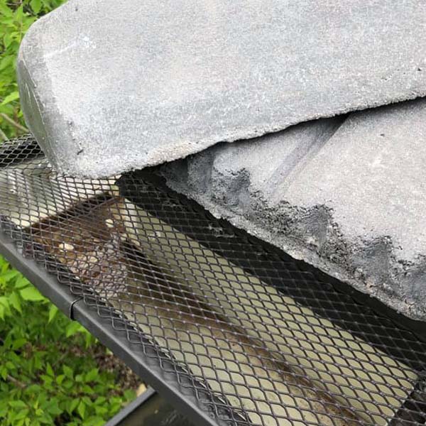 Leaf cover installed on the rain gutter to prevent debris buildup and simplify cleaning in Utah
