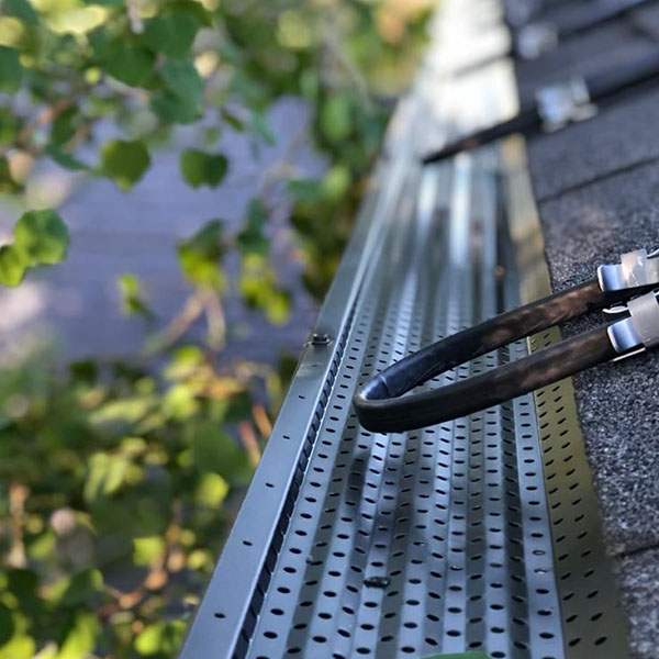 Heat cable installed along the roof edge to prevent ice dams and snow in Salt Lake County, UT